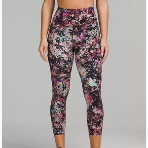 Lululemon multi-colored Base Pace HR Crop 23” pants.